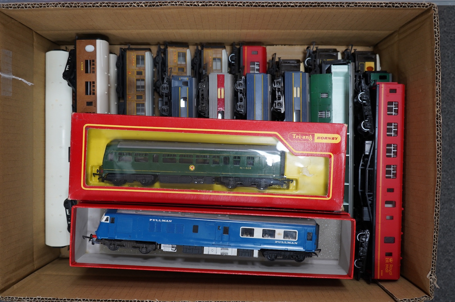 A collection of 00 gauge railway by Hornby, Tri-ang, Lima, etc. including seven locomotives and twenty-six bogie coaches including; LNER, Pullman, Royal Mail, BR, etc. Condition fair to good, some items boxed.